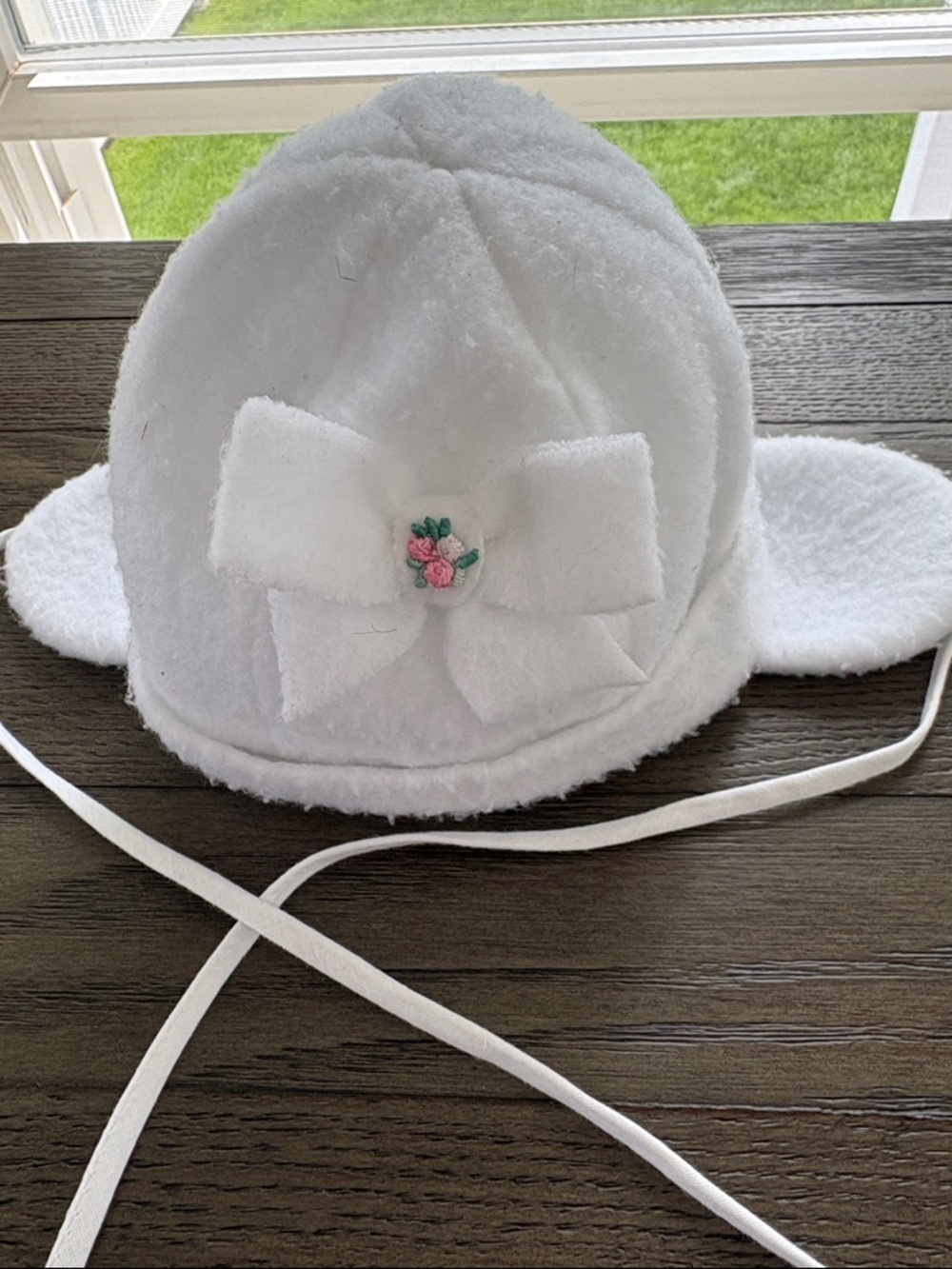 White Plush Baby Bonnet with Bow and Floral Accent